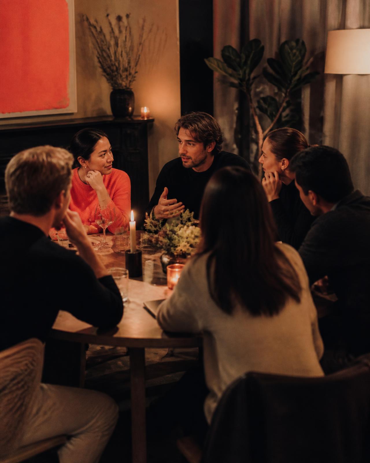A small group in close conversation at a Shipin session